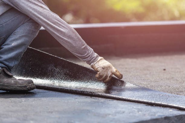 Professional Exterior Waterproofing technician working in Warners, NY